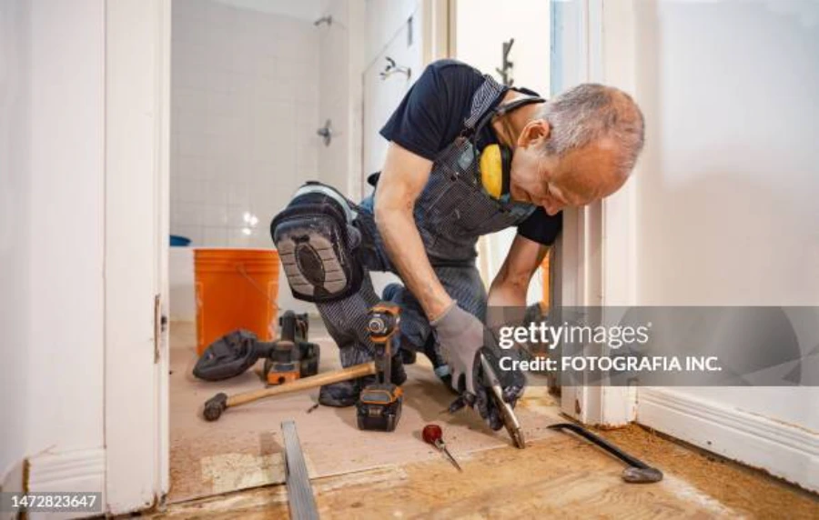 Handyman completing a general repair project in a Dayton, Ohio home